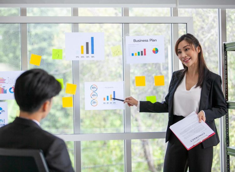 business-team-male-and-female-colleagues-talking-at-work-share-ideas-with-chart-on-glass-board-happy-young-presenttation-colleagues-work-together-on-glass-board-free-photo